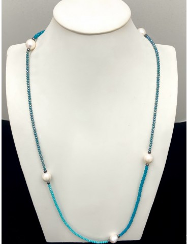 Perles blanches sur cristal...