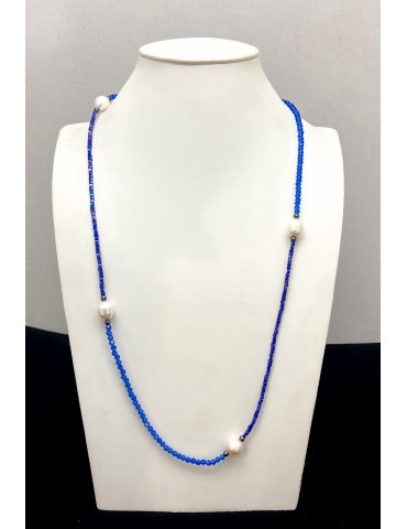 Perles blanches sur cristal...